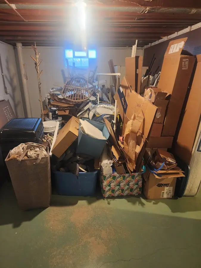 Roll-off dumpster container at job site for Concrete Dumpster Rental in Greenland